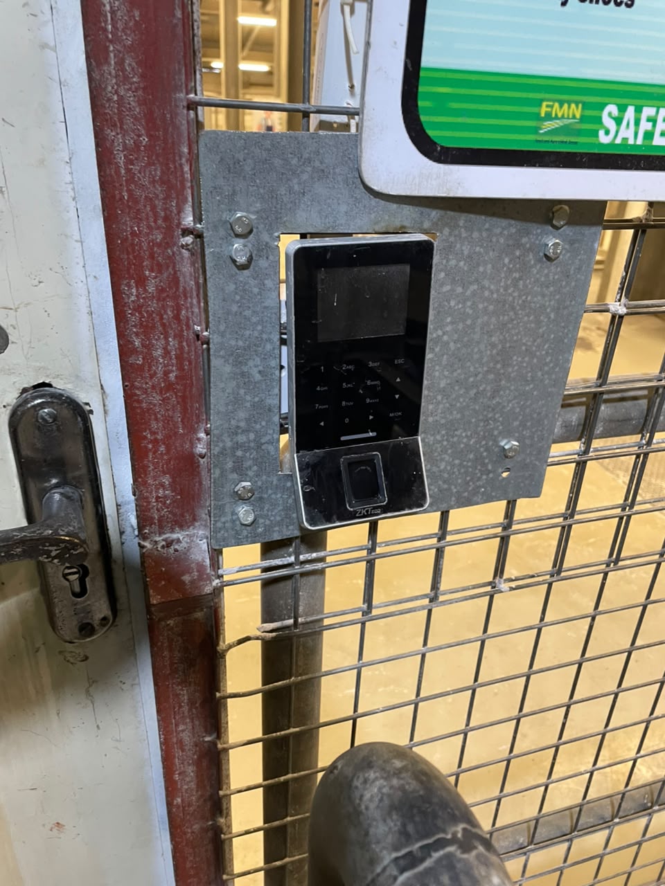 Biometric access-control reader installed at a secured gate